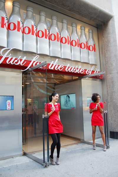 Brand ambassadors in matching outfits greeted passersby with complimentary bottles and promises of food inside.