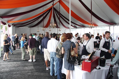 Chandeliers and strips of colored fabric decorated the top of Terlato Wines International's tent.