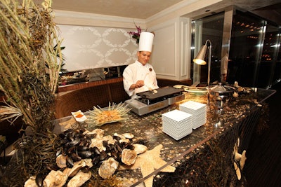 At a V.I.P. cocktail reception in the hotel's Lockwood restaurant, a chef served mini lobster skewers from a station decked with starfish and seaweed.