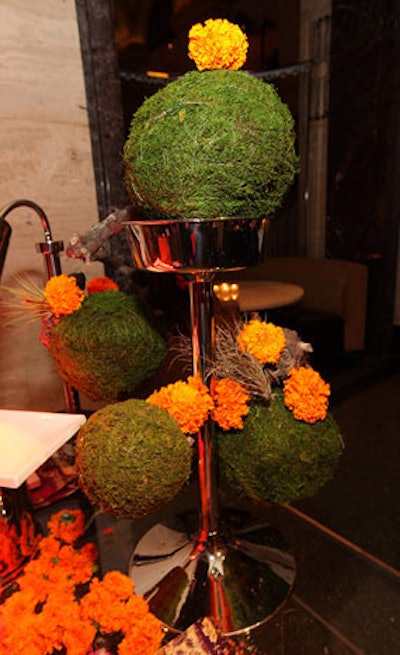 Marigold flowers and round topiary adorned the tandoori chicken station.