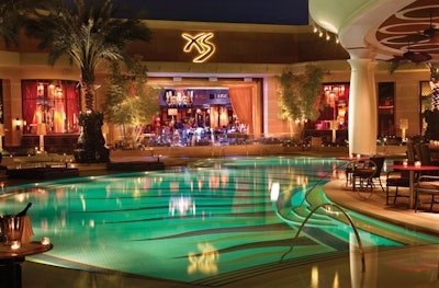 The Encore's club XS spills from the indoor space to the property's poolside area.