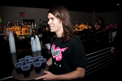 Servers bussed drinks early in the night and cleared tables during the four-hour screening.