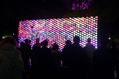 Artist Alexandra Gonzalez used repurposed materials and water bottles stained and lit to act as pixels to create 'Nite Lite' in Trinity Bellwoods Park.