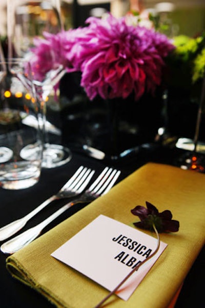 Gileta Design supplied the flowers, including a dark purple stem at the place setting of guest Jessica Alba.
