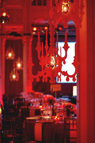 Bakula installed a modern take on chandeliers with silhouettes of ornate fixtures assembled like 3-D puzzle pieces.