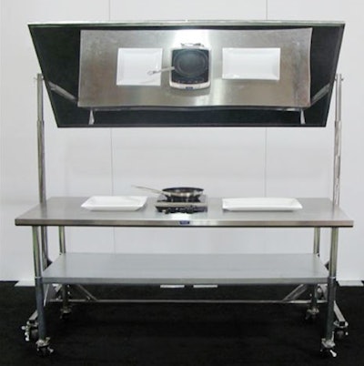 Town & Country Event Rentals offers a new cooking demo table that includes a mirror and storage shelf.