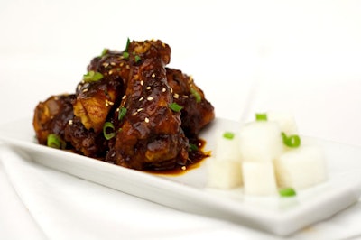 Gyenari offers a Korean catering menu that includes spicy garlic chicken wings with pickled daikon.