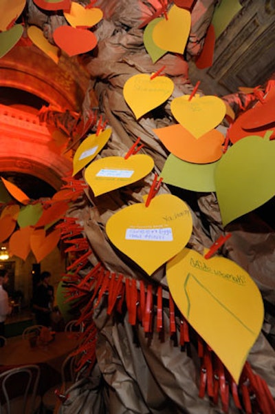 A 14-foot-tall tree stood at the center of Astor Hall, and Reader's Digest invited guests to write the title of their favorite books on leaf-shaped pieces of paper.
