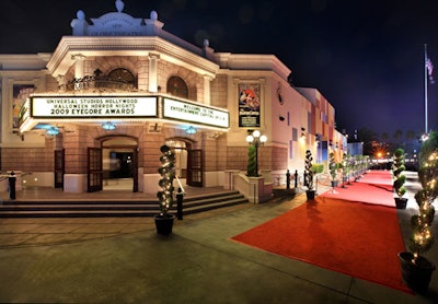 Lights twinkled in topiaries that flanked the red carpet outside the Globe Theater.