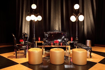Lounge areas around the room included black and gold seating accented by French-style lamps.