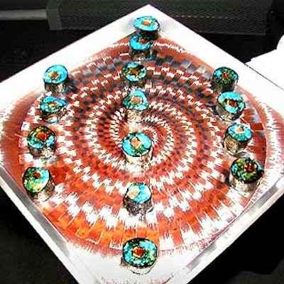 Tentation served neon blue sushi on a metallic 3-D platter at the Outrageous Contemporary Decorative Arts from Britain auction at Sotheby's. (Photo courtesy of Tentation)