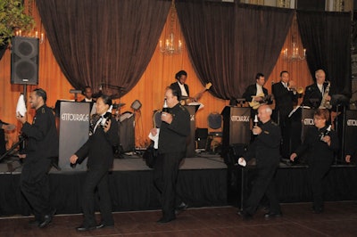 In the ballroom, orange and brown draping behind the bandstand mimicked the hues in Renee Fleming's album-cover photo.