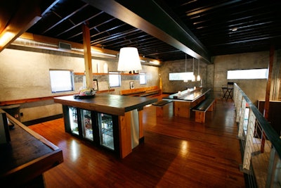 With its long picnic table for 20 and private kitchen, Studio A's mezzanine level is designed with both business meetings and dinner parties in mind.