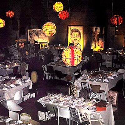 In the dining area, Chinese lanterns covered with brightly patterned silk scarves provided ambient lighting, guests sat at an eclectic mix of tables and chairs--everything from old Victorian styles to Jacobean chairs to modern, futuristic pieces.