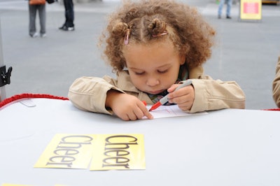 Attendees could write and post messages of support for Canada's athletes on the Cheerios Cheer wall.