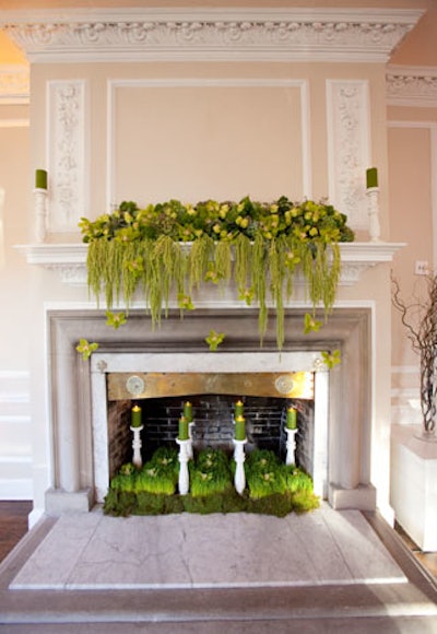 For the Ridgewells party, Exquisite Floral Design covered fireplaces with green orchids and candles, inside and out.