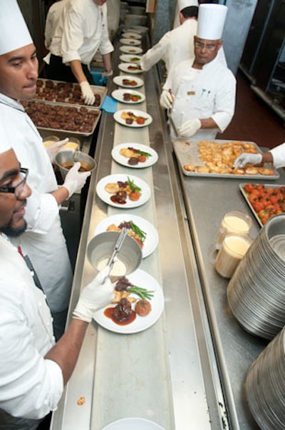 The Marriott Wardman Park Hotel had chefs in an assembly line to feed the more than 900 guests simultaneously.