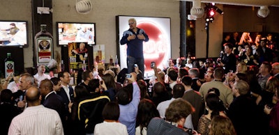 Guy Fieri kept the crowds entertained in his rock 'n' roll lounge at the Chelsea Market event.