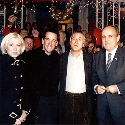 Olympic gold medal figure skater Oksana Baiul, Fox weatherman Dave Price, Robert De Niro and mayor Rudy Giuliani were on hand for the Christmas tree lighting ceremony that opened the festival. (Photo by Battman Studios)