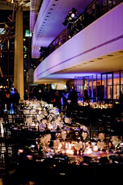 Balconies on the venue's grand promenade were lit in shades of purple that became more intense with height.