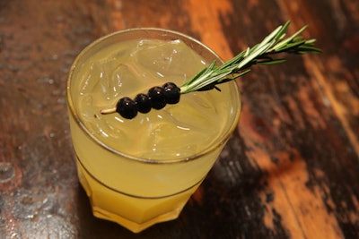 Some cocktails came garnished with blueberries and rosemary sprigs.