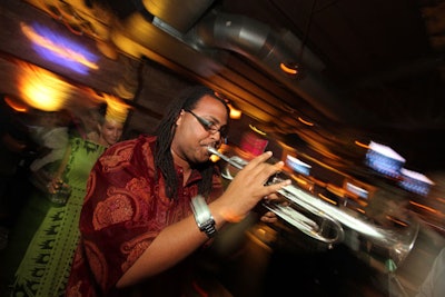 After event organizers aired Absolut's new television spot, trumpeter Leon Allen performed.