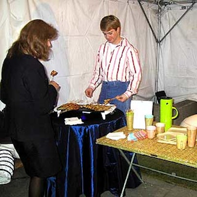 A grill set up with a square of sod and funky furniture mimicked casual dining in the '70s.