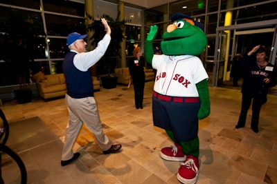 Red Sox mascot Wally offered high-fives to arriving guests.