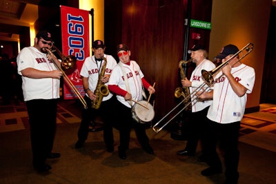 A five-piece brass band in Sox Jerseys played in the foyer.