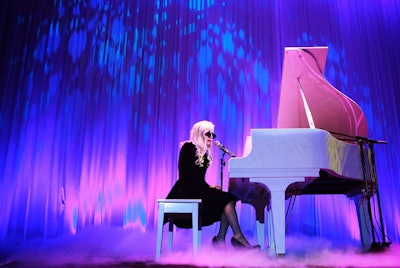 A demurely dressed Lady Gaga performed John Lennon's 'Imagine' during the dinner, changing some of the words to reflect the evening's equality theme.