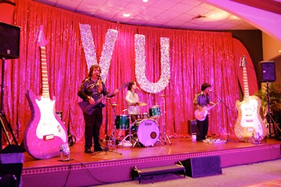 The DC3 band sang hit songs from the '60s, '70s, and '80s throughout the night in between the choreographed musical and dance performances.