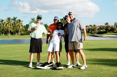 The final hole required groups to pose with a pair of oversize Puma shoes. The best picture won a prize at the end of the night.