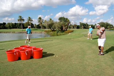 The Golf Pong hole, similar to the drinking game beer pong, required players to chip golf balls into six large red barrels.