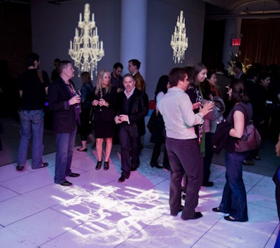 The festival kicked off on Thursday night with Chelsea Market After Dark, where Event Energizers designed a white lounge for Sandra Lee that included a dance floor and projections of chandeliers.