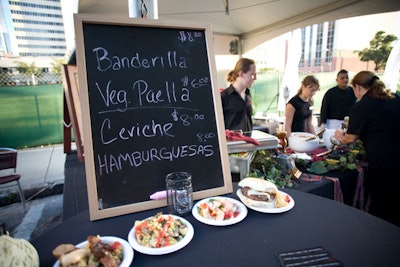 Ceviche restaurant served paella, ceviche, and tapas at its station in the food village.