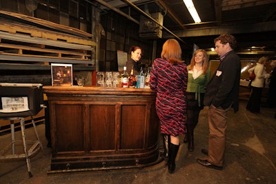 Bartenders prepared cocktails at a bar used on the set of Carter's Way.