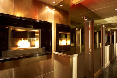 A fireplace is built into the wall in the lower-level hallway where the 20 private washrooms are located.