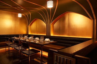 Graphic ceiling treatments add to the Art Deco feel.