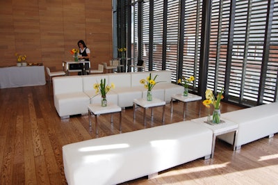 Cream lounge furnishings from Luxe Rentals provided seating for the media in attendance.