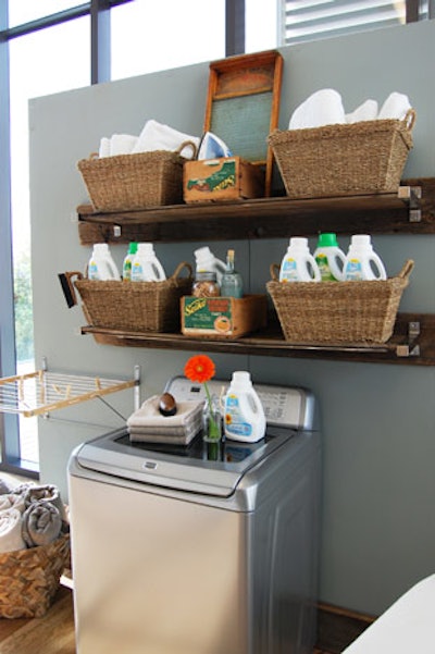 Christine Roberts of Judy Inc. designed the event and created a laundry-room display using environmentally friendly products such as eco paint and shelves made of reclaimed wood.