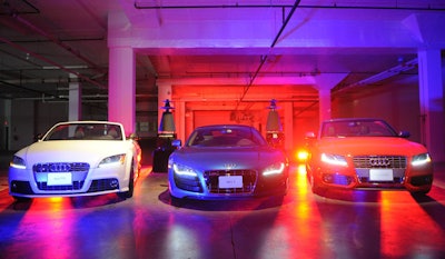 Three Audi vehicles provided a backdrop for the fashion show.