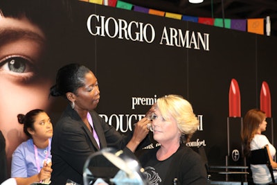 Giorgio Armani supplied makeup booths on the exhibit floor and in a backstage tent for speakers.