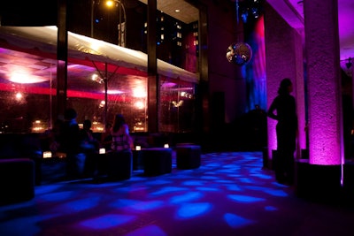 Donatella Versace and her recent runway show inspired the Studio Party's pink, purple, and blue lighting.