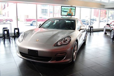 Three new Porsche Panameras were on display in the showroom.