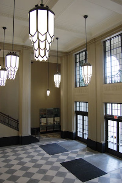 Original Art Deco details such as pendant lighting, railings, and flooring remain in the north and south lobbies.