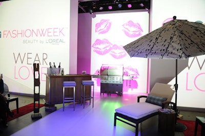 A Broil King barbecue and lounge furniture created by Bustle in collaboration with Andrew Richard Designs dressed the runway.
