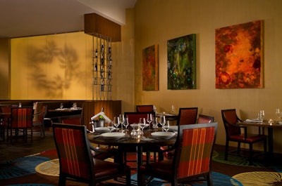 The main dining room can seat 120 at banquettes, two tops, and rounds of five.
