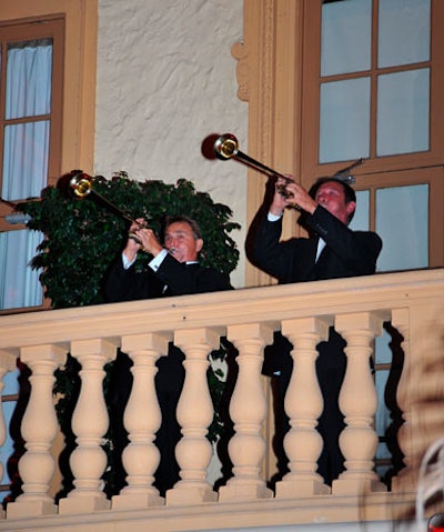 The Miami Herald Trumpeters played on the balcony overlooking the fountain and courtyard area to announce the opening of the main ballroom for dinner and the night's program.