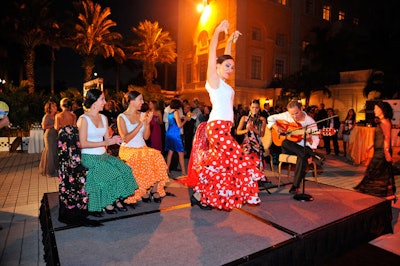 Flamenco dancers performed in the courtyard accompanied by a guitarist and singer.