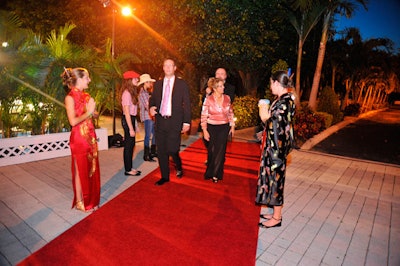 Children ages 13 to 16 greeted guests on the red carpet dressed in traditional clothing from cultures around the world.